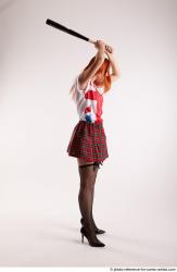 TINA STANDING POSE WITH BASEBALL BAT